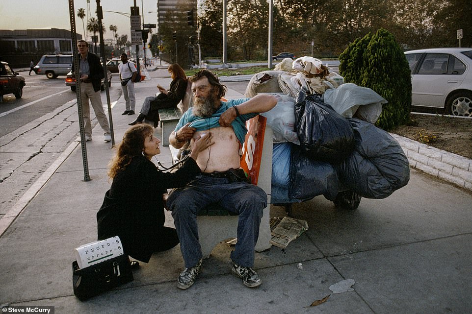 Here, Steve McCurry captures the tender moment of a nurse checking the vital signs of a homeless man in Los Angeles, California