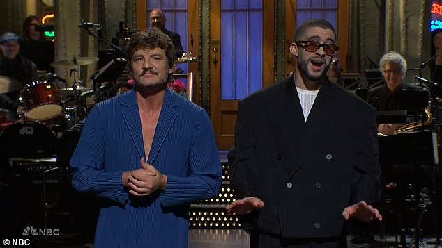 Big night!  The singer (R) got a little help from friend Pedro Pascal (L) during his opening monologue on Saturday evening