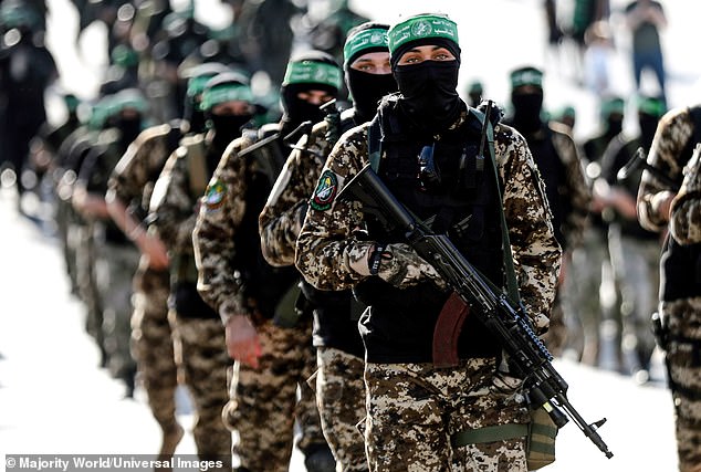 Gunmen from the Izz al-Din al-Qassam Brigades, the military wing of Hamas, take part in a military parade in Gaza City.  Palestine