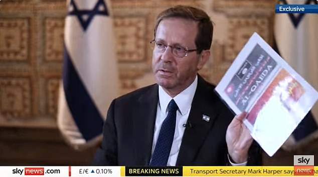 Isaac Herzog said documents found on bodies of dead fighters in Kibbutz Be'eri were 'official Al Qaeda material'