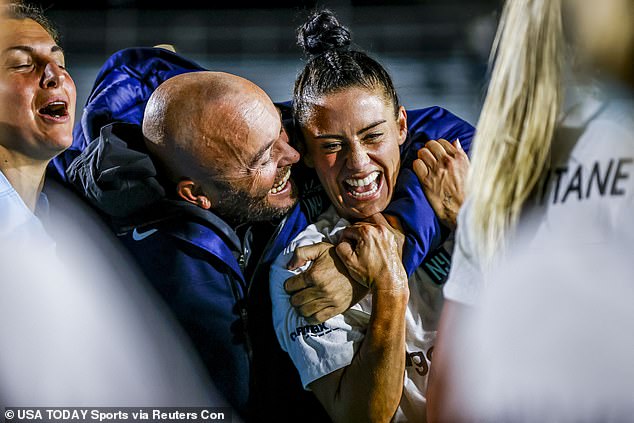 Krieger (seen with coach) and Gotham won that game against North Carolina on Sunday night