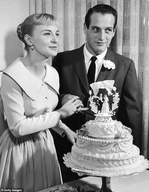 Quick: The couple's divorce was finalized in 1958, and he married Woodward that same year;  Pictured in 1958 cutting into their wedding cake