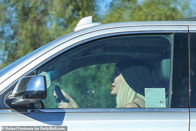 Tori's large SUV has a window sticker for access to the parking lot at the posh private Calabasas Country Club, where memberships start with initiation fees between $20,000 and $40,000, along with monthly fees