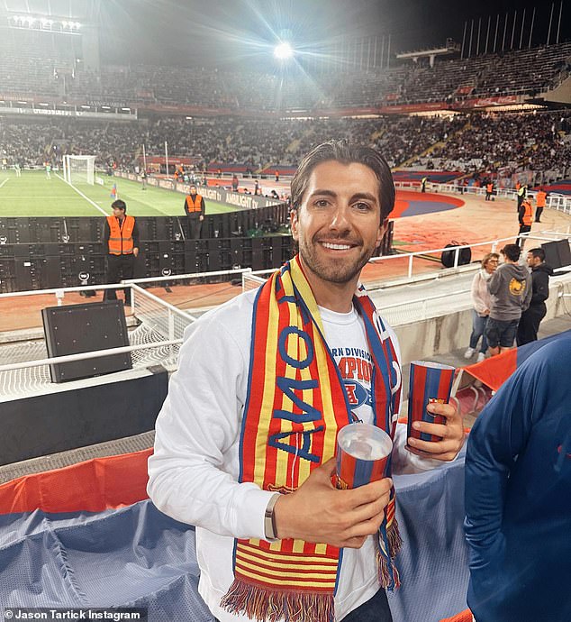 Birthday in Barca: During his trip he also made time to attend a football match to cheer on FC Barcelona.  In the photo he wore a scarf with the club's colors and also two striped cups with the team's logo embroidered on them