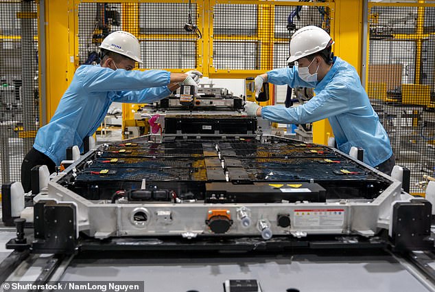 Toyota claims it has achieved a technological 'breakthrough' that will allow it to produce batteries at the same pace as existing electric vehicle batteries.  Pictured is the inside of an electric vehicle battery store at a VinFast factory in Haiphong, Vietnam