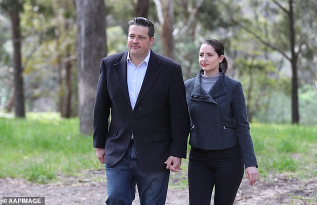 Mr Fowles, a father of four, is pictured with his wife Jessica after a press conference in 2019