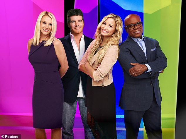 All stars: Singer Britney, now 41, was signed up to appear in series two of the show, alongside (L-R) fellow judges Simon Cowell, Demi Lovato and LA Reid (pictured in 2012)