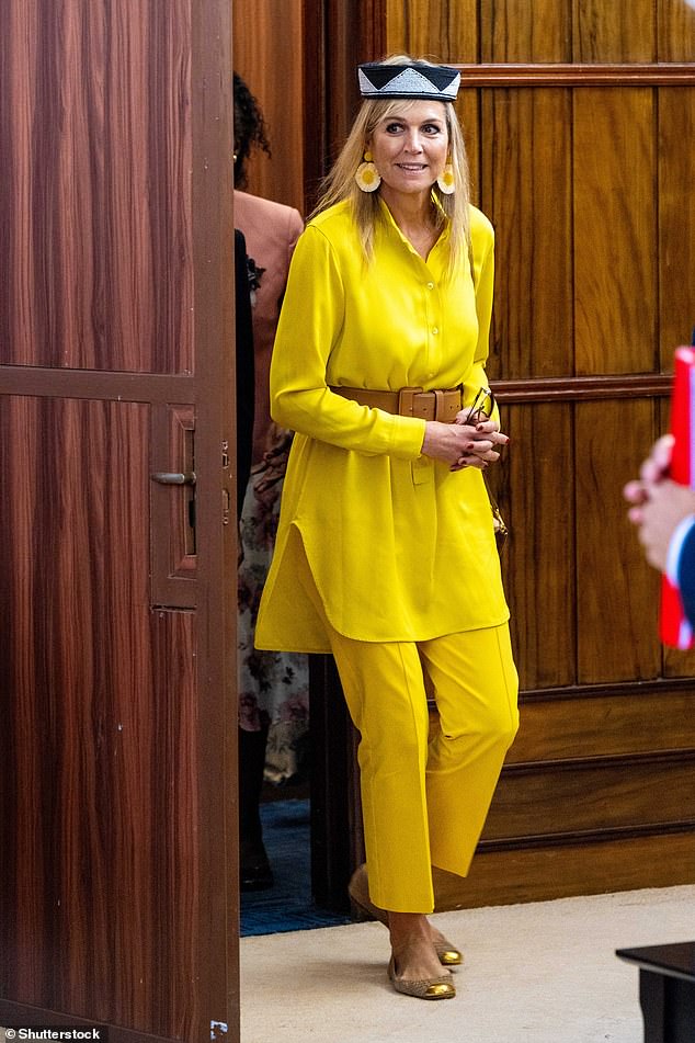 Maxima looked typically chic in bright yellow cords today as she landed in Kenya after a whirlwind trip to South Africa with husband King Willem-Alexander
