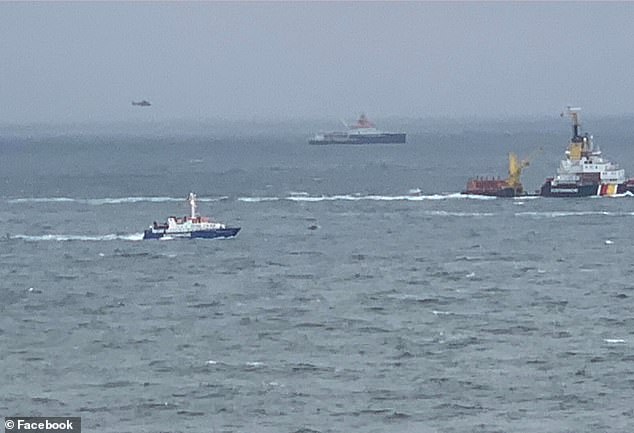 Two rescue cruisers, an emergency tugboat, a pilot boat, a police patrol boat and a helicopter are assisting in the search