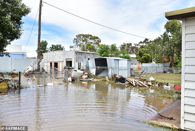 Several communities in regional parts of NSW were ravaged by the floods that hit NSW in 2022, severely damaging homes and properties (pictured)