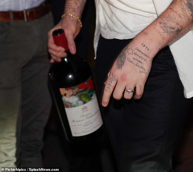 Abundant: He was carrying a large bottle of Château Mouton Rothschild 2015, which costs around £3.8k