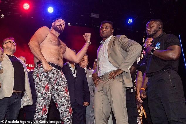 Fury always joked about being overweight and even called himself a 'fat pig' during his press conference with Francis Ngannou in London (pictured above)