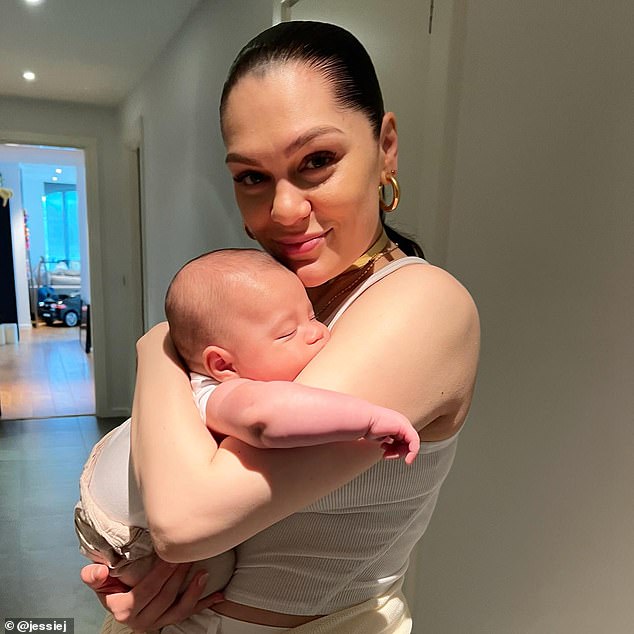 Happy ending: The mother of one welcomed her son Sky with her basketball player boyfriend Chanan Safir Colman in May after the heartbreak of her unborn child's miscarriage