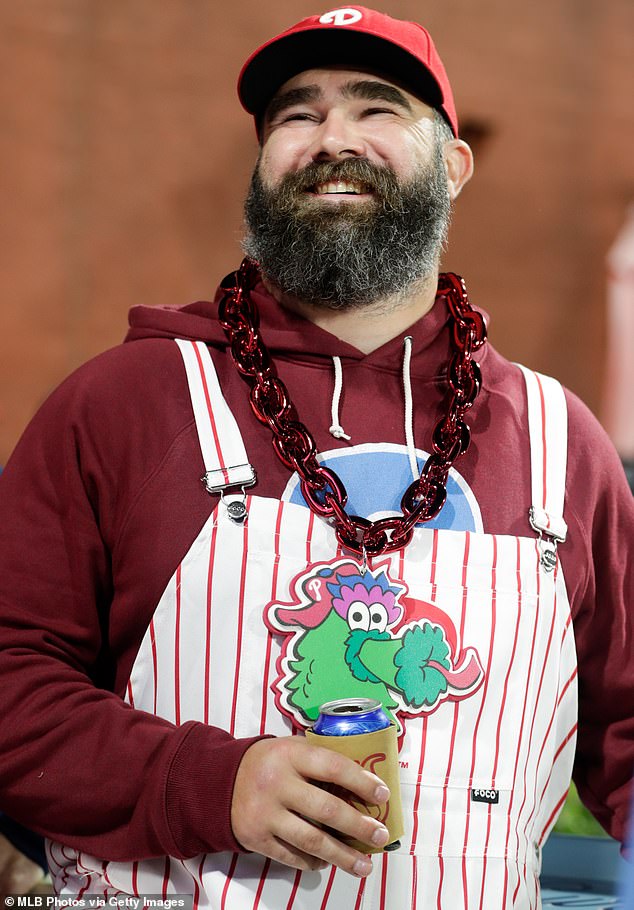 Jason, 35, wore a red and white Phillies cap and dumbaree, with a red chain around his neck