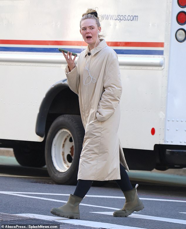 On the road: The actress, 25, left the morning workout class with a cream-colored nylon duster jacket buttoned up, clearly prepared for the cool Big Apple fall weather