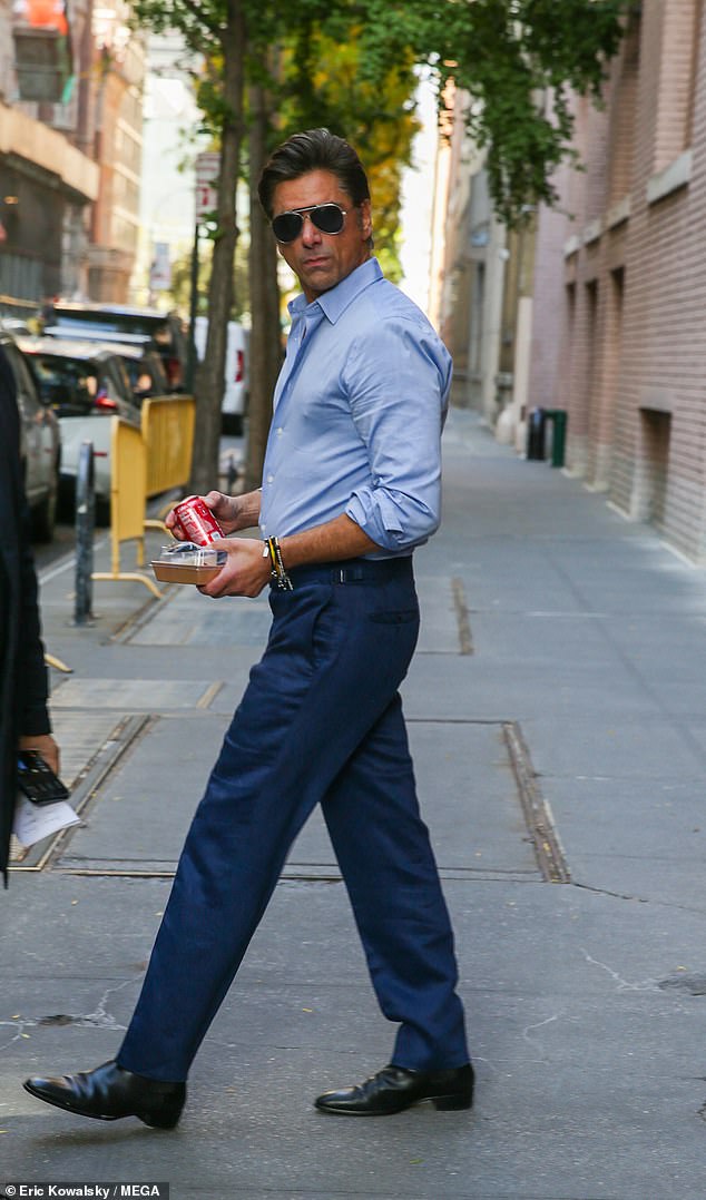 Getting out: Stamos pictured outside The View in New York on Tuesday