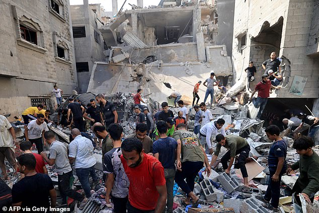 Palestinians search for survivors amid the rubble of a building hit by an Israeli airstrike on October 24 in Khan Yunis in the southern Gaza Strip.