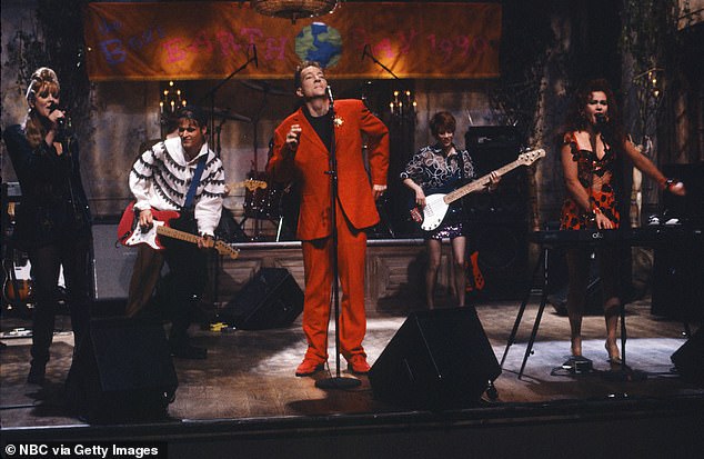 The B-52s - pictured above performing on Saturday Night Live in April 1990 - will now be guests at the Australian State Dinner rather than performing