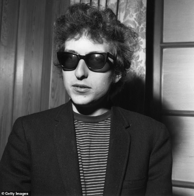 Next one!  The movie star is currently preparing to star in a biopic about folk singer Bob Dylan (pictured in 1965), which will focus on his controversial decision to go electric in 1965.