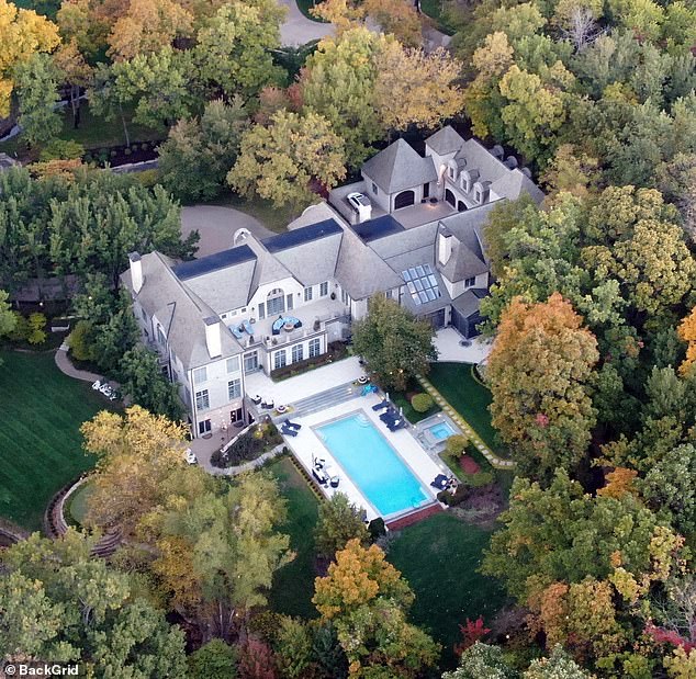 The house also appears to be environmentally friendly with solar panels on the roof