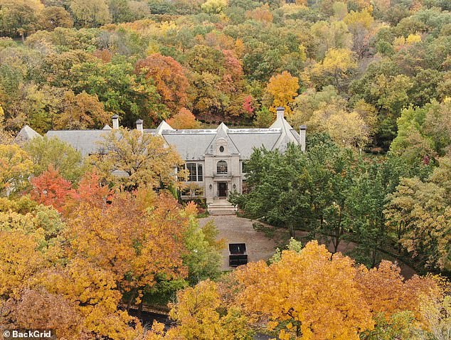 The property's three hectares of land feature picturesque leafy gardens to hide the house from view