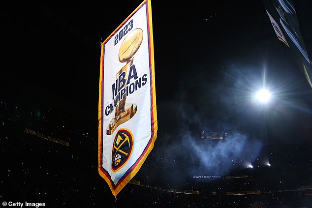 The Nuggets raised their first championship banner before playing the Lakers on Tuesday