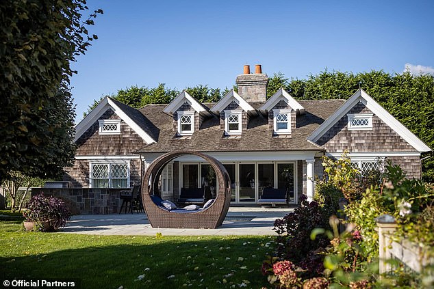 The property also features a charming poolside cottage