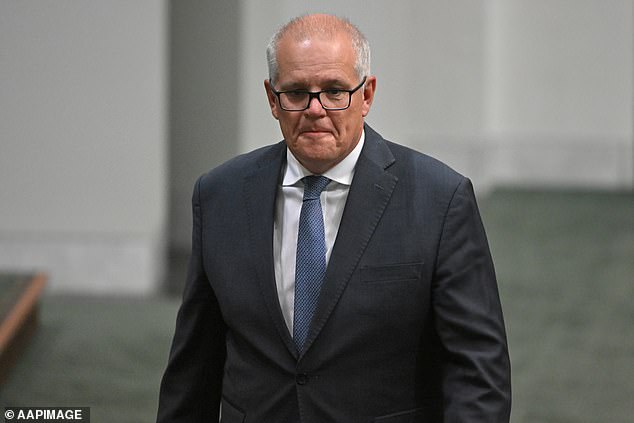 After Ms Hume began accusing Labour, Barr fired back with a reference to the former Morrison government's controversial parking fund, which funneled money into marginal and Coalition-held seats (pictured, former Prime Minister Scott Morrison)