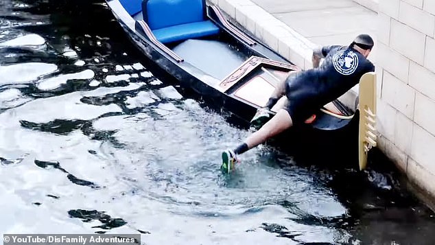 After hitting the water with a huge splash, he quickly swam across the lagoon and struggled to pull himself up on one of the tour boats before dashing out of the water