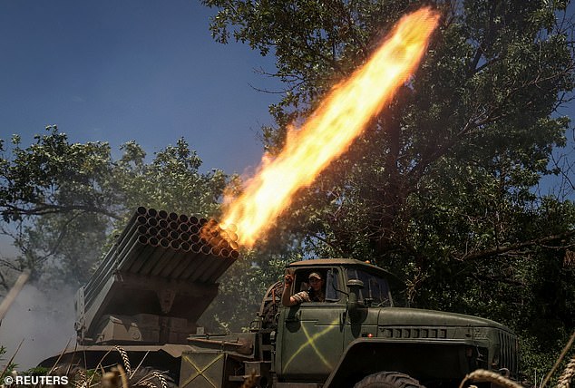 Ukrainian soldiers of the 59th Separate Motorized Infantry Brigade of the Armed Forces of Ukraine fire a BM-21 Grad multiple rocket system at Russian troops near a front line, amid the Russian attack on Ukraine, near the city of Avdiivka