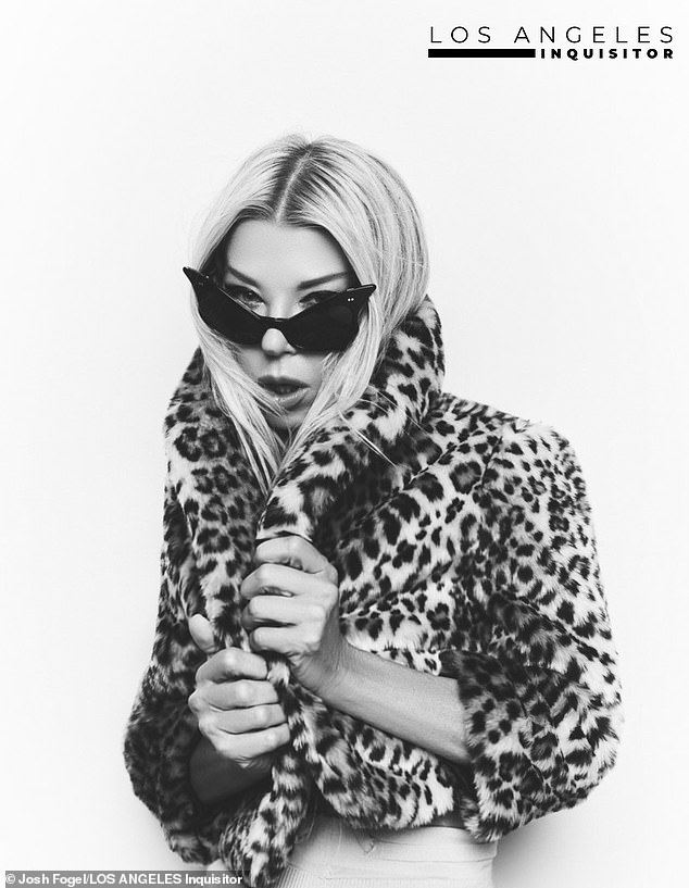 Wild thing!  Tara wore a leopard print jacket and sunglasses in another cool photo