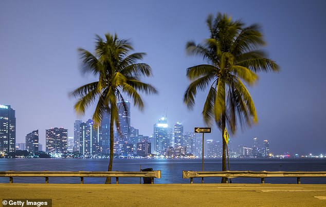 The most popular state to move was Florida, where 91,201 New Yorkers moved in 2022.  (Image: Miami skyline at night)