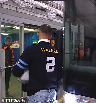 Along with the names on the back, the vests appeared to have what looked like a bracelet on the left side that said 'Manchester City'