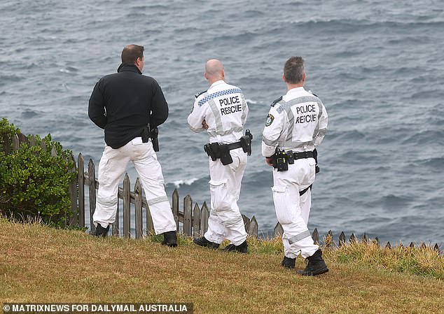 Officers are searching the coastline on Thursday morning at the site believed to be linked to the crime scene in the CBD