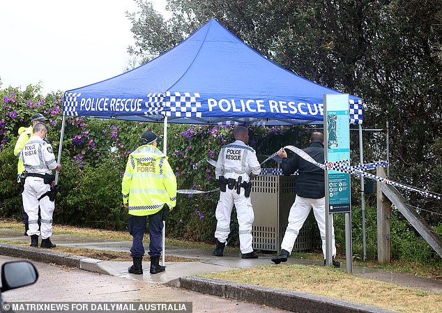 A rubbish bin at Diamond Bay Reserve in Vaucluse has been taped off as part of a crime scene