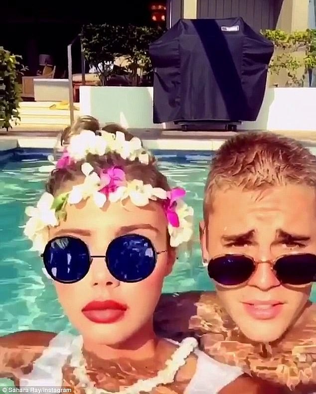 Sahara rose to fame in August 2016 when she was caught by the paparazzi skinny dipping with Justin Bieber (right) in Hawaii