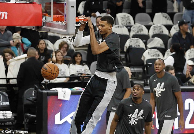 The French teenager warms up ahead of his debut against the Dallas Mavericks on Wednesday