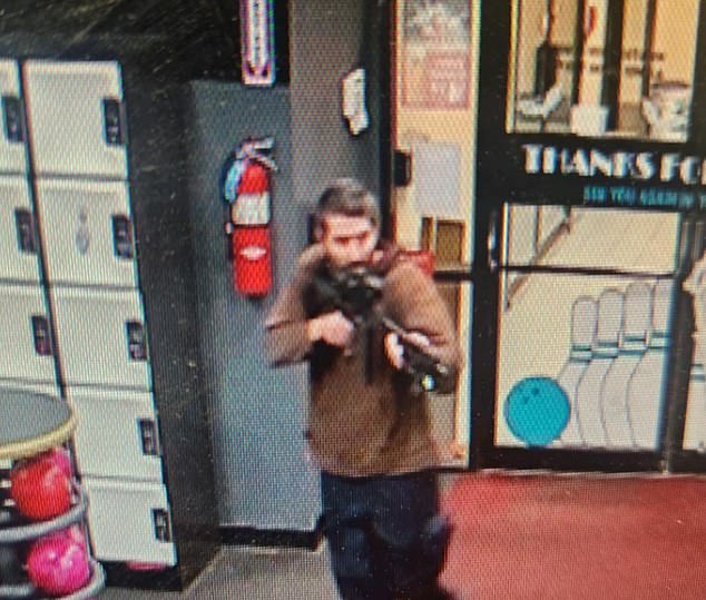 Surveillance footage from Sparetime Recreation's bowling alley showed a bearded man carrying an assault rifle