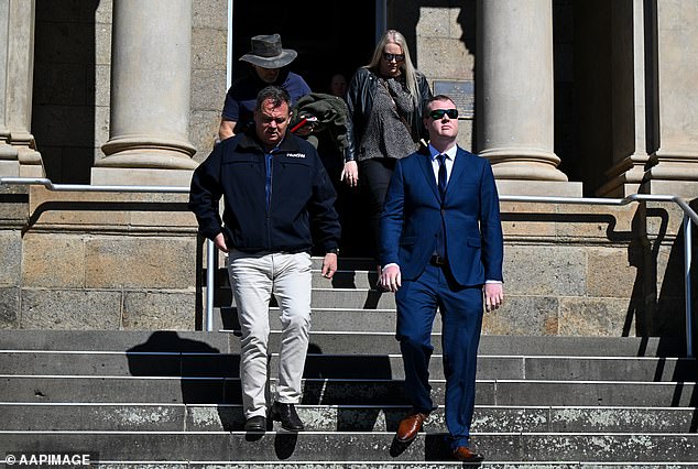 Ms Nowland's daughter will be able to view Senior Constable White's (pictured, blue suit) bodycam footage in December after giving police a statement