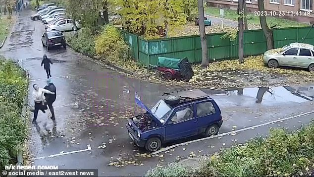 Video shows the pensioner running towards the robber before knocking him to the ground