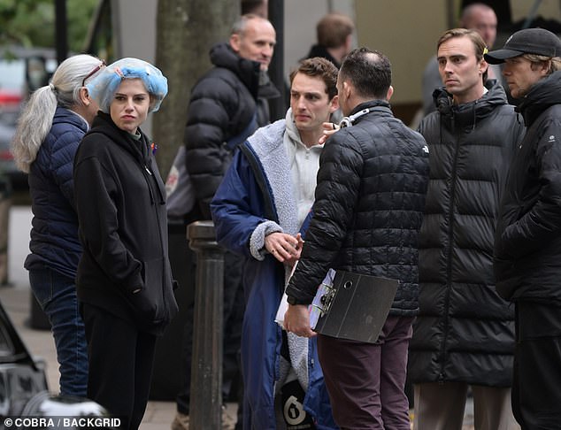 On location: The Bohemian Rhapsody star later donned a black coat as she returned to filming the period drama