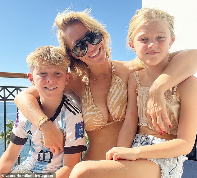 In good company: Hamilton, who is reviewing two hotels in Cyprus, brought her young children Rocco and Tahlia along for the trip (pictured at the five-star Annabelle Hotel)