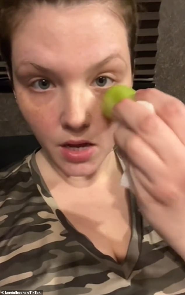 She showed how to use the frozen cucumber.  Here you can see her rubbing it under her eyes