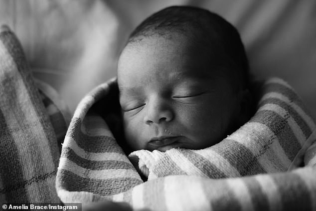 Amelia announced the happy news via Instagram on Thursday, sharing a series of black and white photos of their newborn son sleeping in his crib