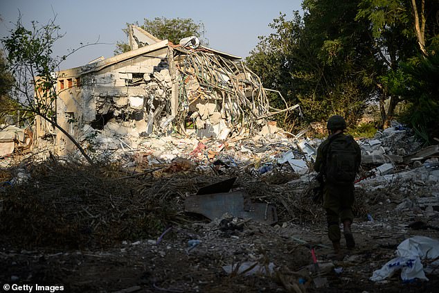 A house destroyed during the attack by Hamas is seen in Kibbutz Be'eri on October 14, 2023 in Be'eri, Israel