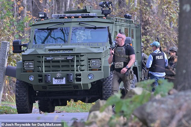 Portland Police and an armored car in a search area in Monmouth, Maine