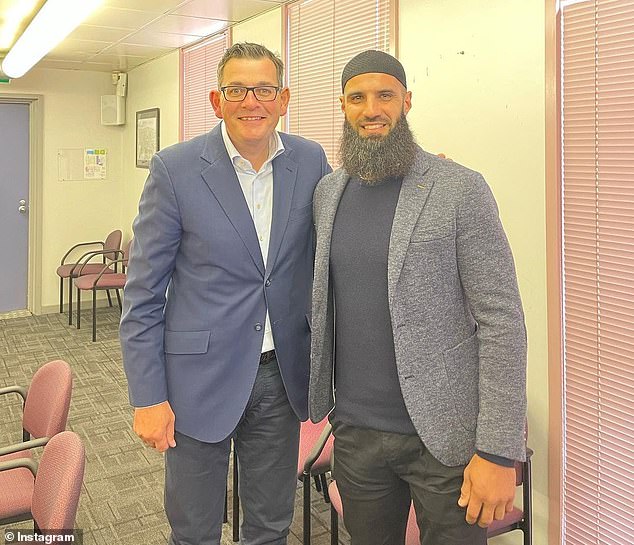 Houli, who retired in 2021, was the first devout Muslim to play in the AFL (photo with Dan Andres)