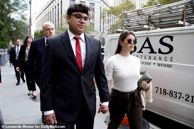 Nishad Singh (pictured arriving at court with girlfriend Claire Watanabe) testified that the company spent millions on celebrity partnerships in early 2022 - as prosecutors tried to show how Bankman-Fried wasted customer money to boost its status