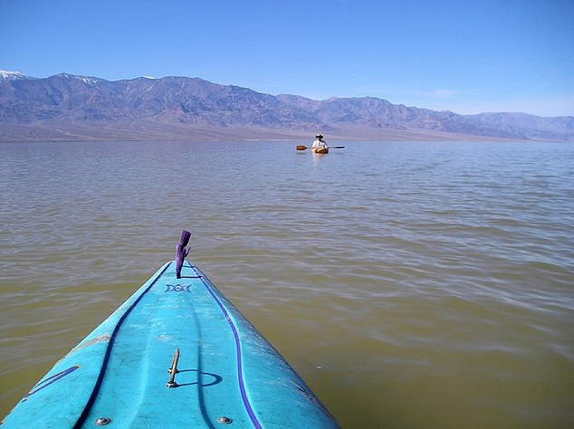 Kayaks are needed to traverse the previously extinct Lake Manly, which has come back to life