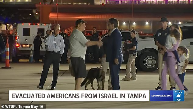 Ron and Casey DeSantis greet hundreds of Americans who fled Israel on the 'DeSantis Airlines' plane that took off with rockets being fired as the US tries to get its citizens out